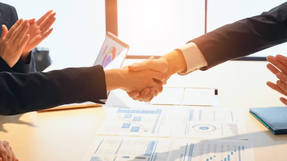 a,group,of,business,people,shaking,hands